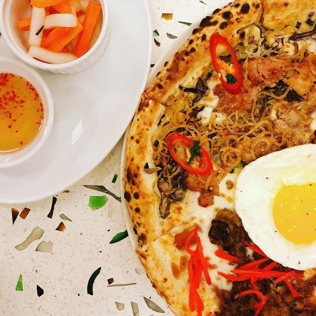 Khám Phá Ẩm Thực Độc Đáo Tại TP.HCM: Bò Bần Ủi, Pizza Cơm Tấm Và Rất Nhiều Món Ngon Khác